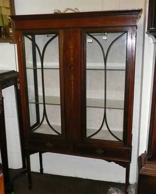 Lot 609 - An Edwardian inlaid mahogany display cabinet