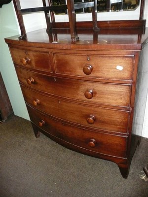 Lot 611 - Victorian mahogany four bow front height chest with later mirror super structure