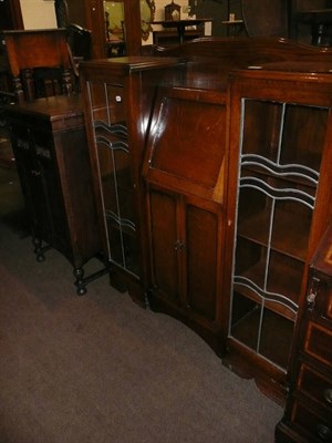 Lot 617 - An oak bureau display cabinet and a gramophone cabinet