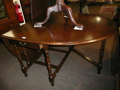 Lot 631 - Oak gateleg dining table