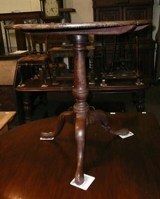 Lot 632 - A George III mahogany tilt top tripod table (a.f.)