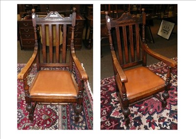 Lot 658 - Pair of early 20th century oak carver chairs