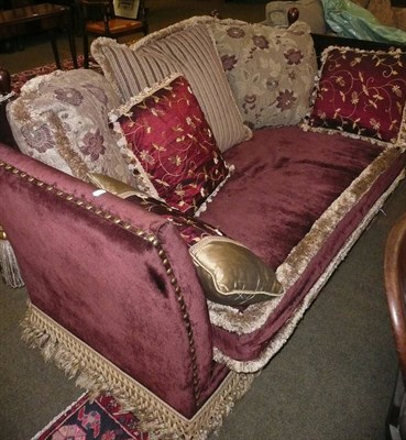 Lot 672 - A Knole settee upholstered in maroon velvet