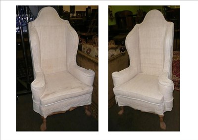 Lot 694 - A pair of high back chairs on Spanish feet with loose covers