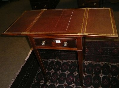 Lot 698 - A 19th century inlaid mahogany writing table with single drawer and fold over top