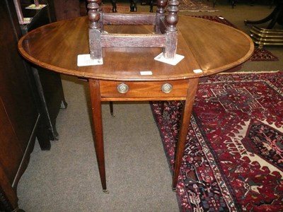 Lot 701 - A Georgian mahogany Pembroke table