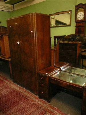 Lot 729 - A 1920s walnut wardrobe, tall boy and dressing table (3)