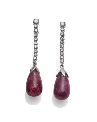 Lot 268 - A Pair of 18 Carat White Gold Ruby and Diamond Drop Earrings, a row of round brilliant cut diamonds