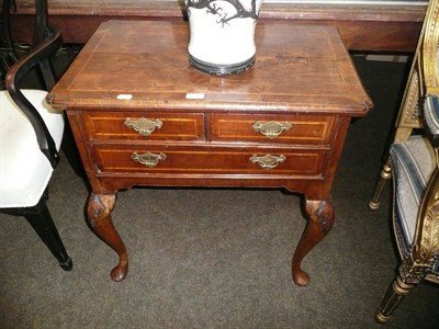 Lot 764 - A walnut low boy with later legs