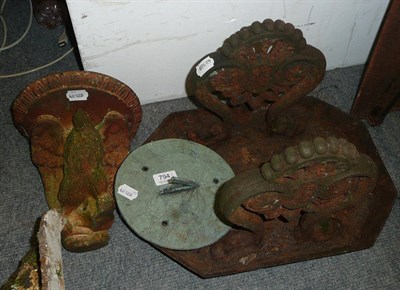 Lot 794 - A Victorian cast iron boot scraper, a terracotta wall bracket and a sun dial