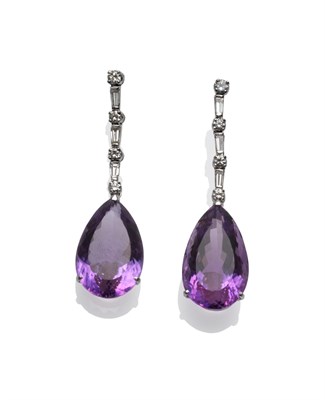 Lot 275 - A Pair of 18 Carat White Gold Diamond and Amethyst Drop Earrings, alternating round brilliant...