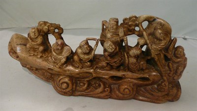 Lot 8 - A honey soapstone boat of the Eight Immortals, first half 19th century
