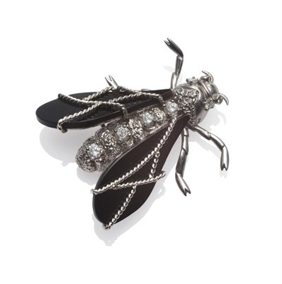 Lot 286 - A Platinum, Diamond and Onyx Insect Brooch, attributed to Chaumet, the stylised bug with head...