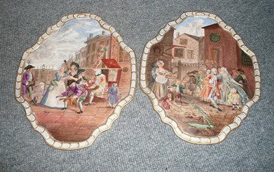 Lot 43 - Two Lille porcelain plaques painted with street scenes