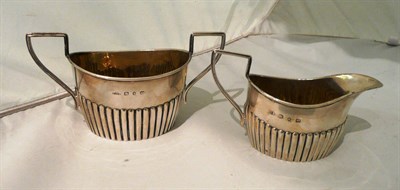 Lot 62 - Silver milk jug and sugar bowl