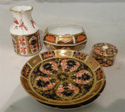 Lot 73 - A Royal Crown Derby small dish, two saucers, a patch box (a.f.) and a small vase (5)