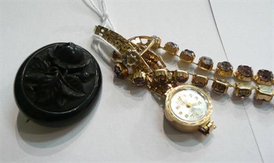 Lot 79 - A gold watch with gold bracelet strap, a gold ring, a brooch and a necklace