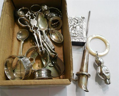 Lot 91 - Box of small silver including sugar nips, baby's rattle, napkin rings, condiment spoons, etc