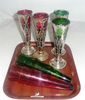 Lot 154 - Four coloured glass vases in silver stands and six glass liners