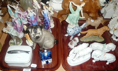 Lot 157 - Two trays of porcelain and other figures including a large figure of a lion, Art Deco ladies, etc