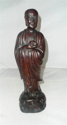 Lot 176 - A large hardwood carving of a luohan