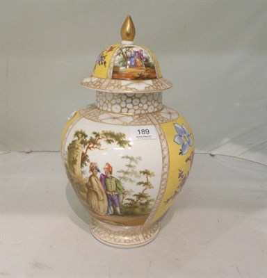 Lot 189 - A Dresdon vase and cover painted with figures and floral sprays.