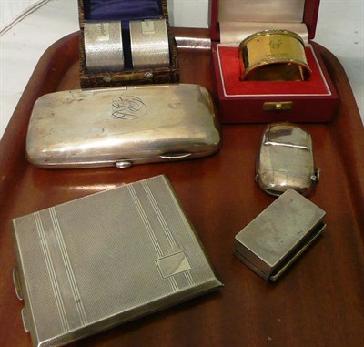 Lot 205 - A silver card case, a cigar case, three napkin rings, etc