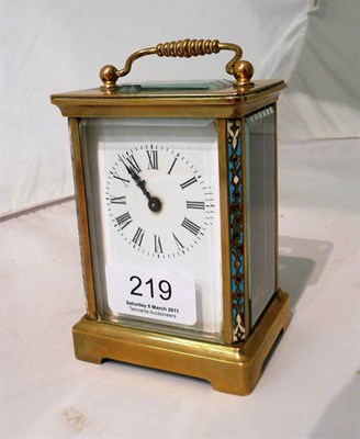 Lot 219 - A brass and champleve enamel carriage timepiece