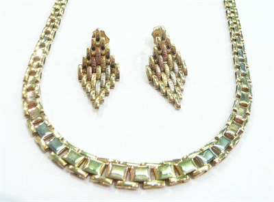 Lot 237 - A 9ct three colour gold brick link necklet and a similar pair of earrings