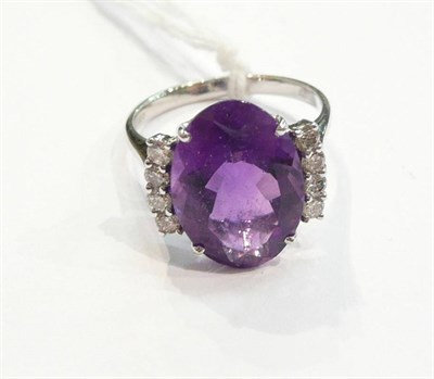 Lot 238 - A 14ct white gold amethyst and diamond ring