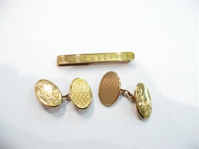 Lot 245 - Pair of 9ct gold cuff-links and a 9ct gold clip