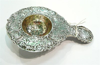 Lot 257 - A hallmarked silver strainer