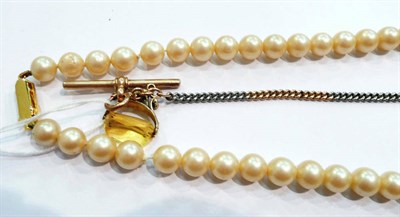 Lot 258 - Two coloured watch chain, swivel fob and a simulated pearl necklace