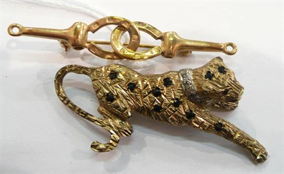 Lot 288 - A horseshoe brooch and a panther brooch