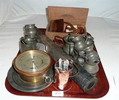 Lot 310 - Tray of pewter measures and plate, an aneroid barometer, buttons etc