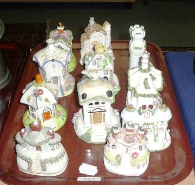 Lot 331 - Eleven assorted pastel burners modeled as house, cottages and castles