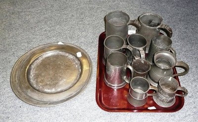 Lot 333 - Two pewter plates and a tray of assorted tankards