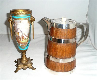 Lot 336 - An oak coopered punch jug and a Sevres style garniture vase