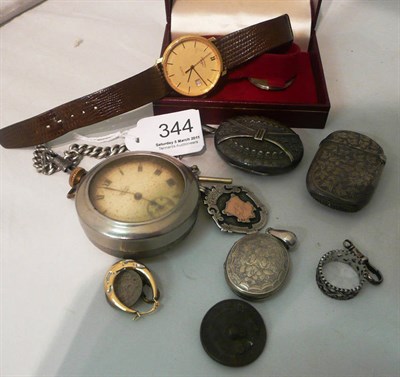 Lot 344 - A silver locket, a silver vesta, a silver albert chain with medals, etc