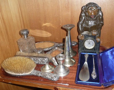 Lot 359 - A tray including silver mounted dressing table set (af), plated ware and an automata monkey...