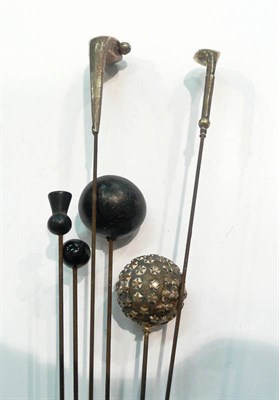 Lot 407 - Two golfing hat pins, etc