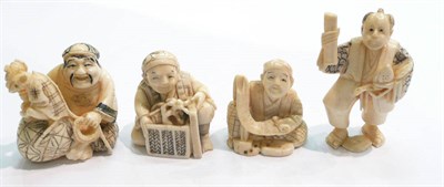 Lot 410 - Four early 20th century carved netsukes