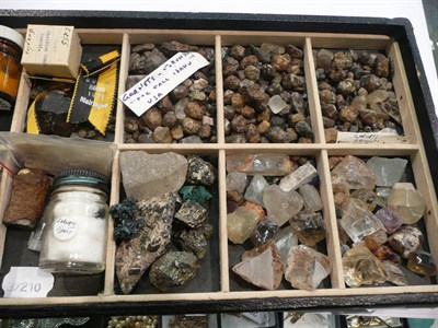 Lot 435 - A tray of rough stones including four bottles labelled 'sapphire', 'garnets', 'corundum' and...