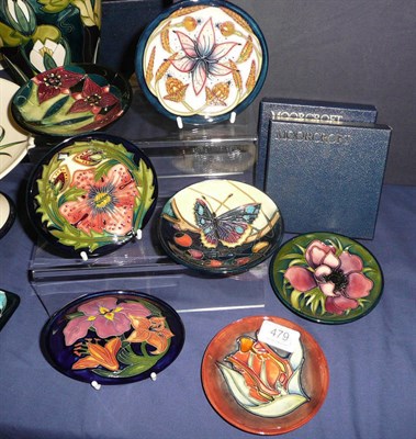 Lot 479 - A Moorcroft 'Tulip' dish, a Moorcroft 'Pheasants Eye' 780/4 dish designed by Shirley Hayes, a...