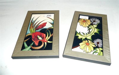 Lot 496 - A Moorcroft 'Daisy May' plaque and a Moorcroft 'Satin Flower' plaque (2)