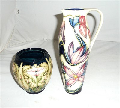 Lot 508 - A Moorcroft 'Wyevale' jug designed by Philip Gibson (second) and a Moorcroft 'Arvensis' jar...