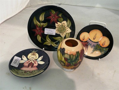 Lot 509 - A Moorcroft 'Christmas Rose' dish designed by Nicola Slaney, numbered 12, a Moorcroft 'Candlelight'