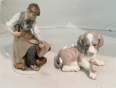 Lot 523 - Lladro puppy with snail on paw and a Lladro cobbler