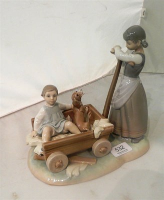 Lot 532 - Lladro group modelled as a two girls and a puppy