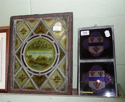 Lot 585 - Three stained glass panels